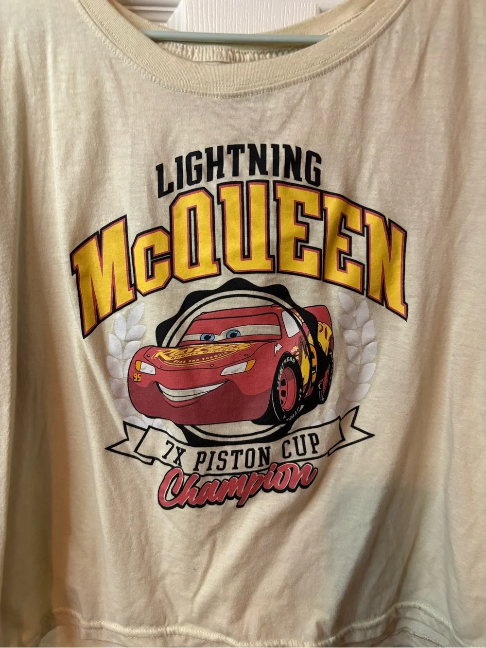 Disney Cream Lightning McQueen Crop Top Tee with Red and Yellow Graphic